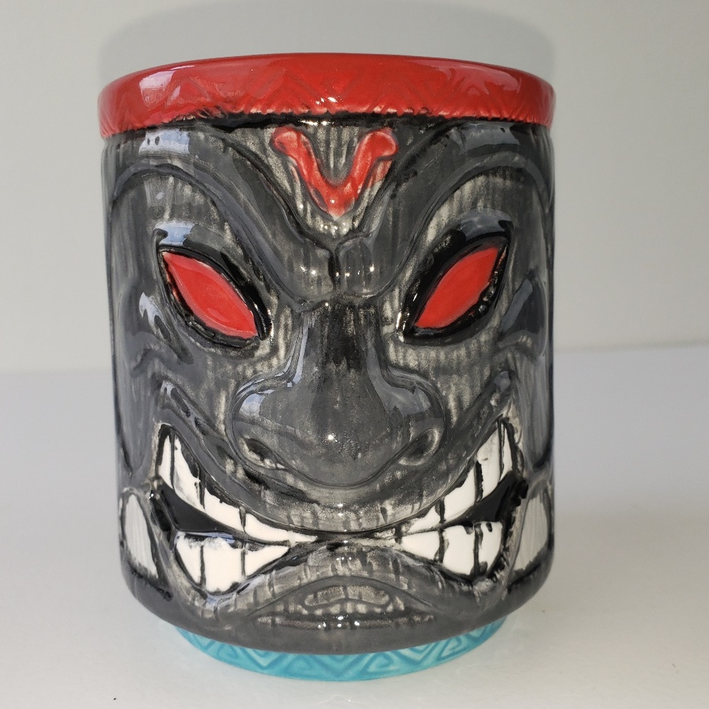 The Potters' Quarter Two face embossed mug
